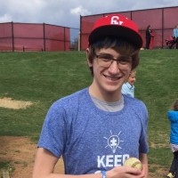ryan smiling on a baseball field