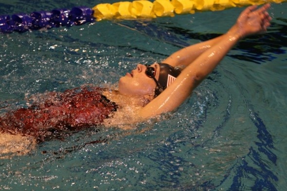 Beth swimming the backstroke.