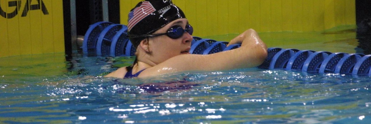 Sports and Rehabilitation After Spinal Cord Injury Beth swimming.