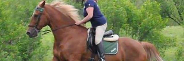Amanda riding her horse.