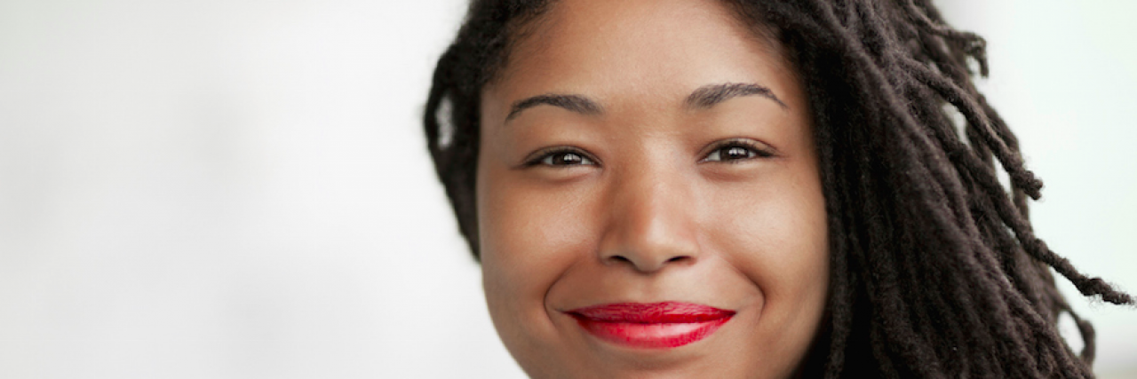 Black Women and Mental Health Counseling Portrait of smiling Black businesswoman with dreadlocks