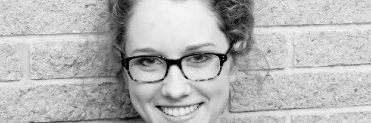 Advice to My Teen Self With Juvenile Myoclonic Epilepsy Black and white photo of contributor smiling and wearing glasses