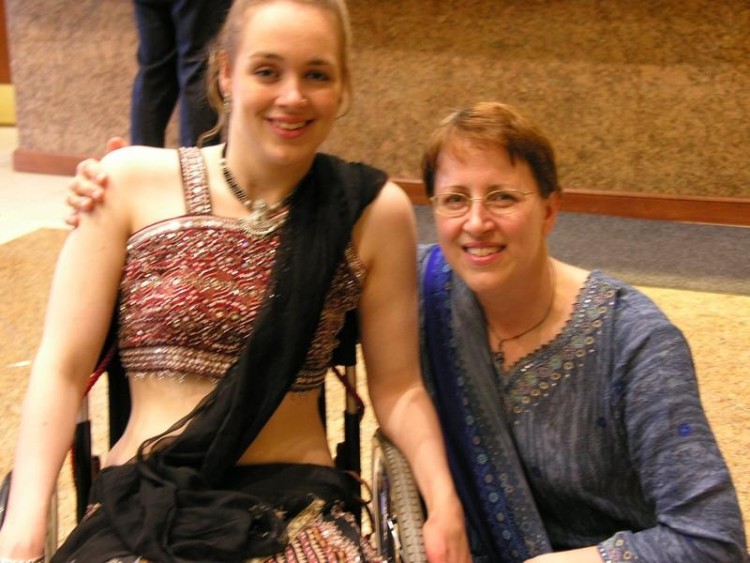 Cindy and her daughter - a young woman in a wheelchair with her mom