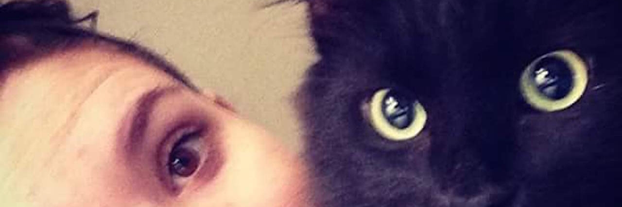 How a Cat Helps Get Through Bipolar Depression The author and her black cat.