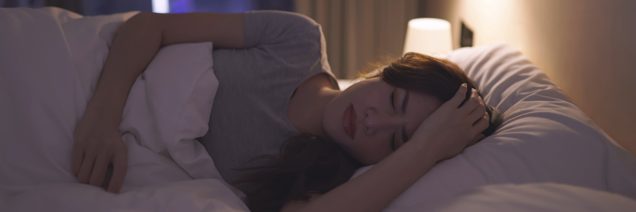 Painsomnia: Can't Sleep Because of Chronic Pain A woman laying in bed who can't sleep