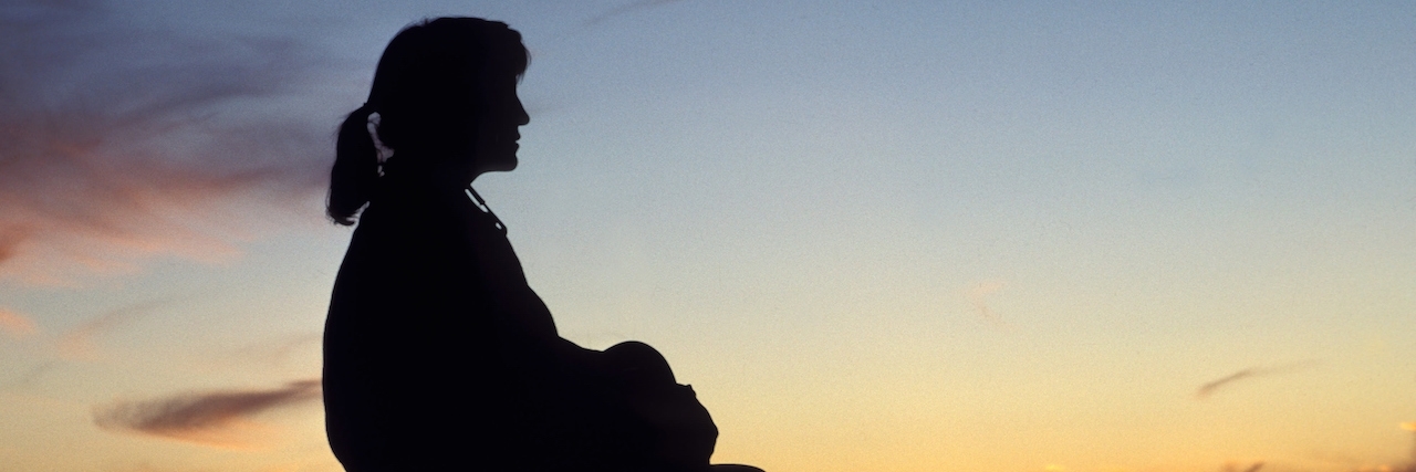 Being Defined By Illness After Starting Out Healthy silhouette of woman looking at sunset