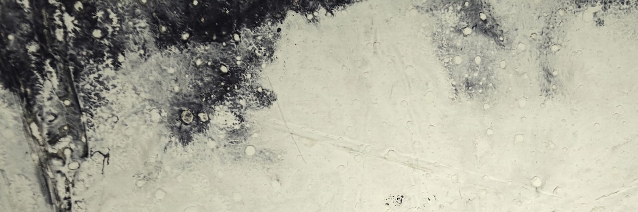 Military vs. Civilian PTSD: A Divide in the Community Textured background: Abstract black paints on gray canvas