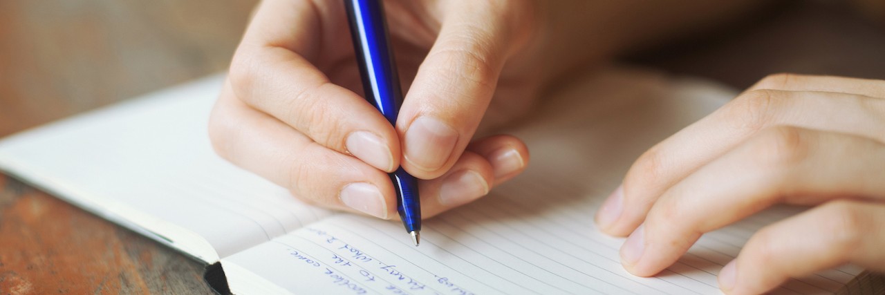 A Letter to My Son's Undiagnosed Anemia Disease hands writing a letter