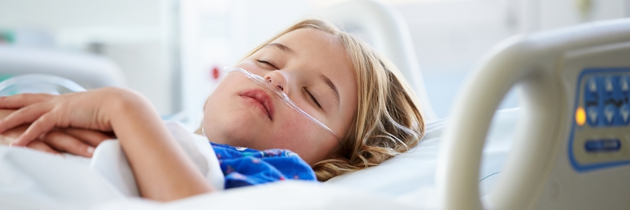 Peaceful And Relaxed Young Girl Sleeping In Intensive Care Unit