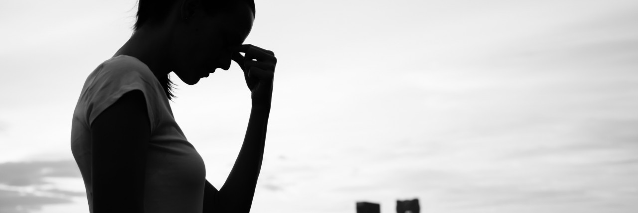 Why Luck Is Just One Part of the Story Regarding My Spinal Cord Issues woman looking stressed