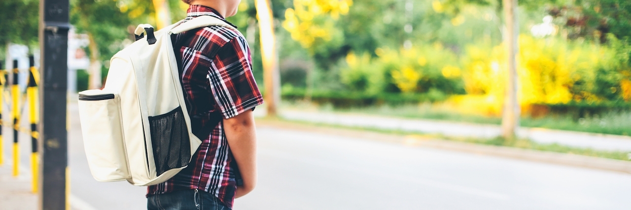 Parents of Children With Bipolar Disorder: You Are Not Alone A little boy with a backpack about to cross the street.