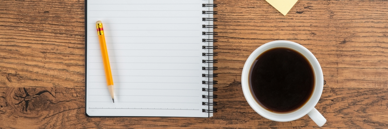 Coping With My Depression by Making Lists Notebook with pencil Adhesive Note and cup of coffee, Planning