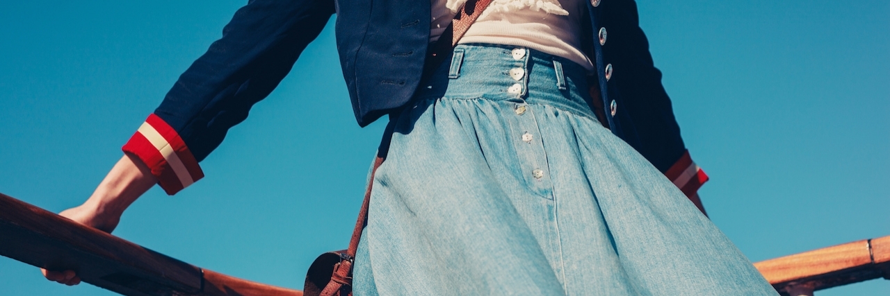Therapist Judged Bipolar Disorder Symptoms Based on Appearance Young woman on the deck of ship with skirt blowing