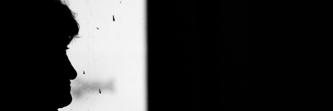 To Anyone Contemplating Suicide Silhouette of lone woman in window of train.