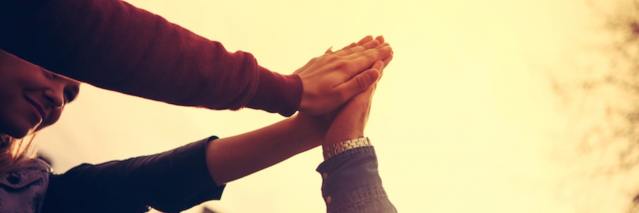 What to Say to Someone Who Attempted Suicide several people high-fiving