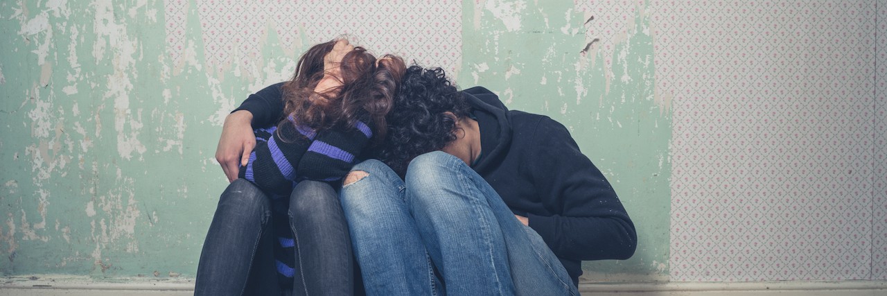 What It's Like to Love With Borderline Personality Disorder Sad young couple on floor