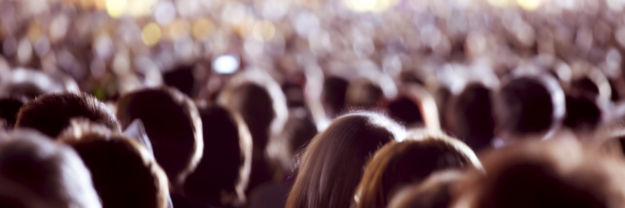 Feeling Anxiety in a Crowded Room Large crowd of people