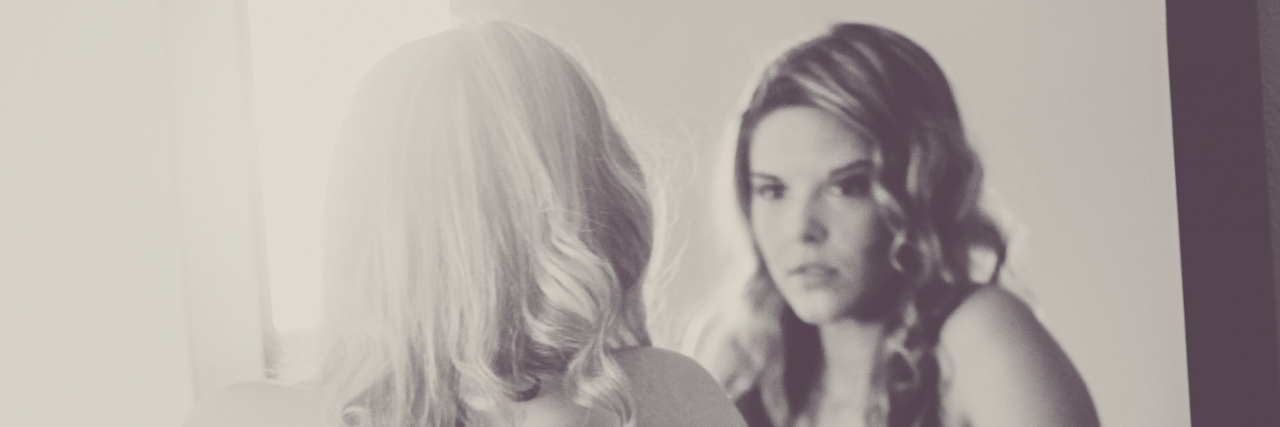 Having an Eating Disorder in the Summer black and white portrait of blonde in bathing suit