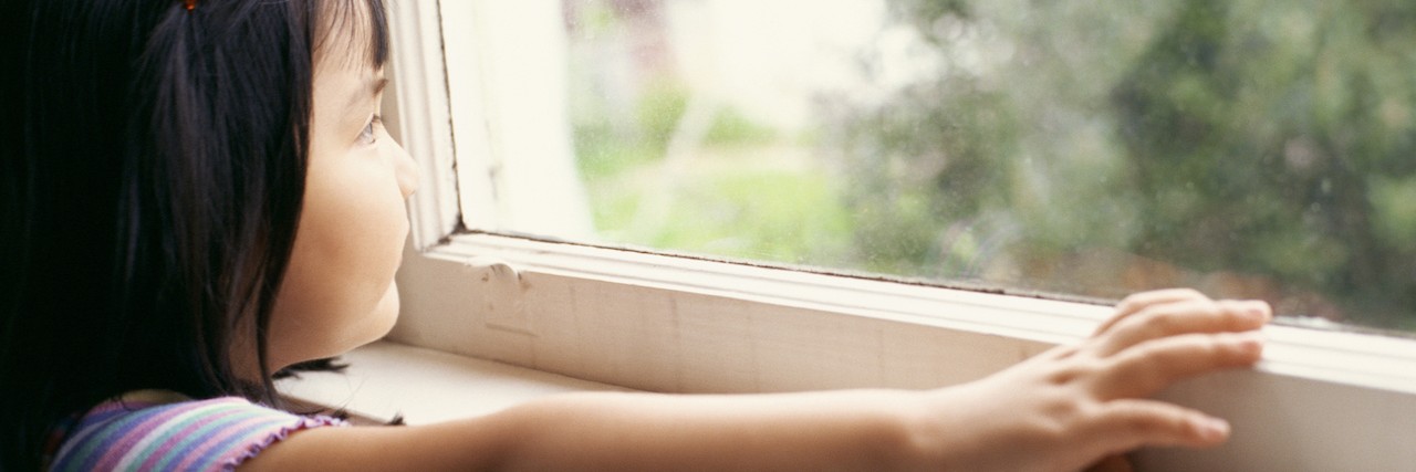 Advice For a 'Sick Kid' With Juvenile Rheumatoid Arthritis young girl looking out window