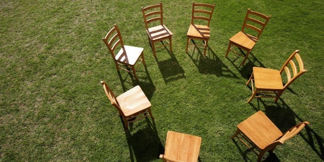 Chairs on lawn forming circle, elevated view