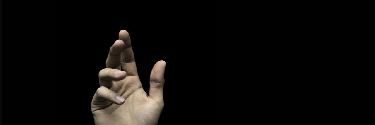 Am I Suicidal or Seeking Attention? hand reaching out