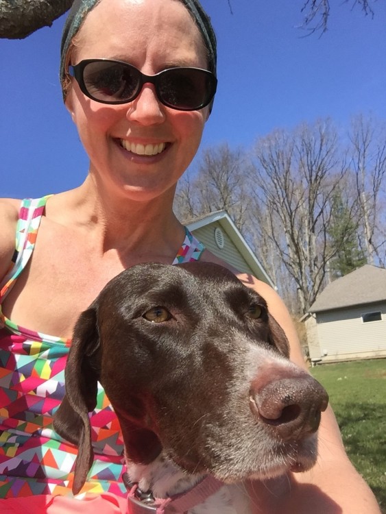 Alethea and her dog enjoying the outdoors.