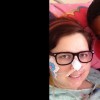 girl in a hospital gown with her friend