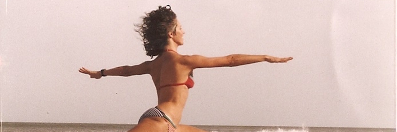 Taking it Slow: Figuring Out Parkinson's Treatment The author jumping on the beach