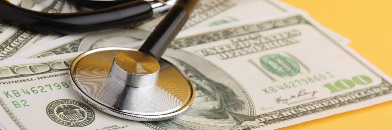 Americans Spend Over $200 Billion Treating Mental Health Conditions stethoscope on dollar