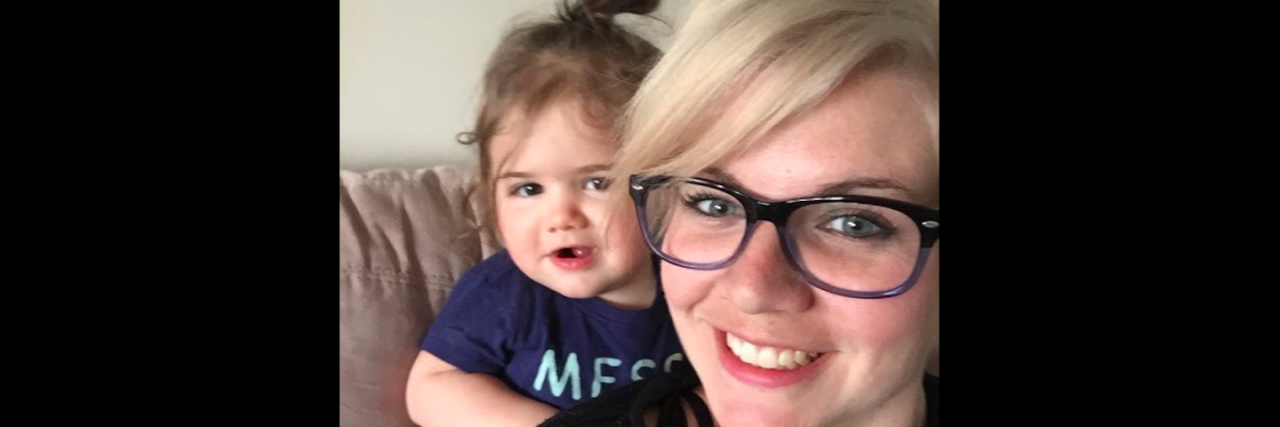 My Guilt That I'm Not the Mom I Would Be If I Wasn't Sick Contributor smiling with her daughter watching behind her