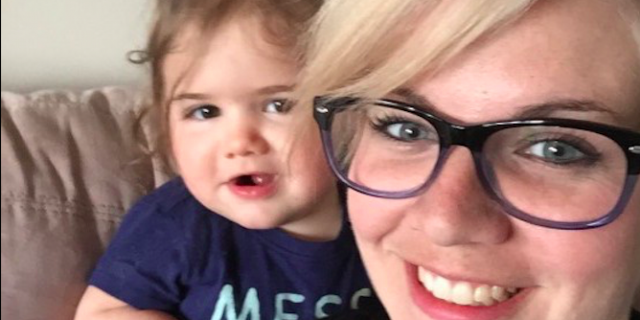 My Guilt That I'm Not the Mom I Would Be If I Wasn't Sick Contributor smiling with her daughter watching behind her