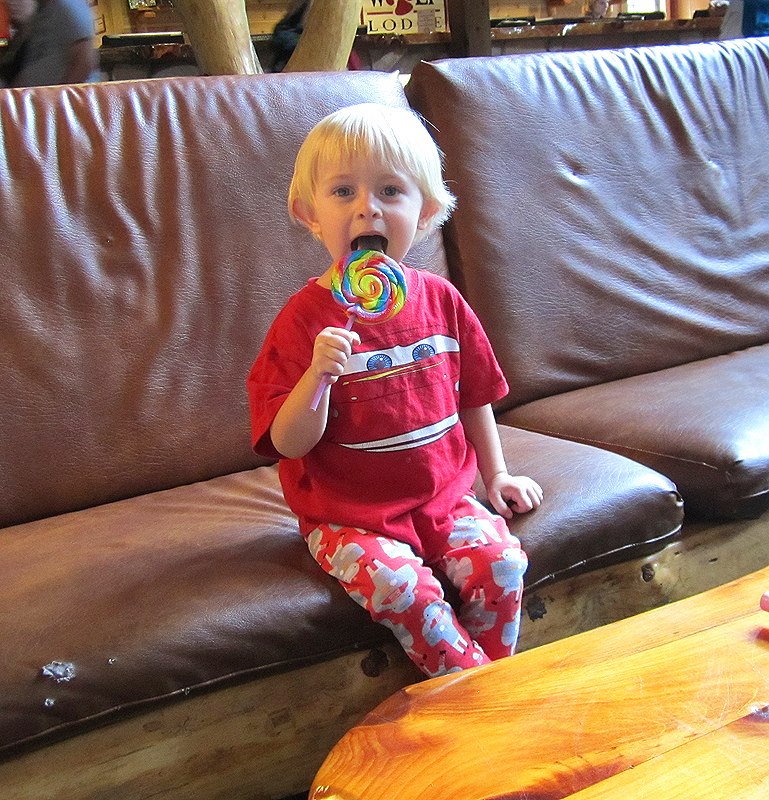 ryan eating a lollipop