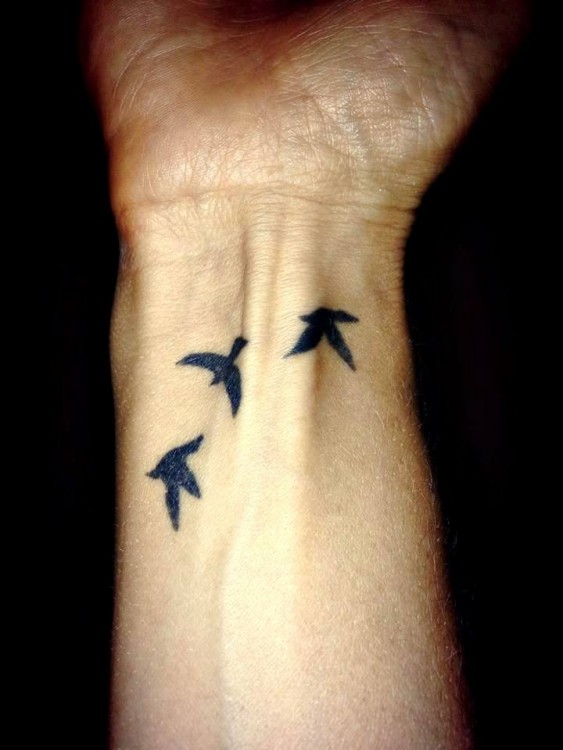 tattoos of three birds
