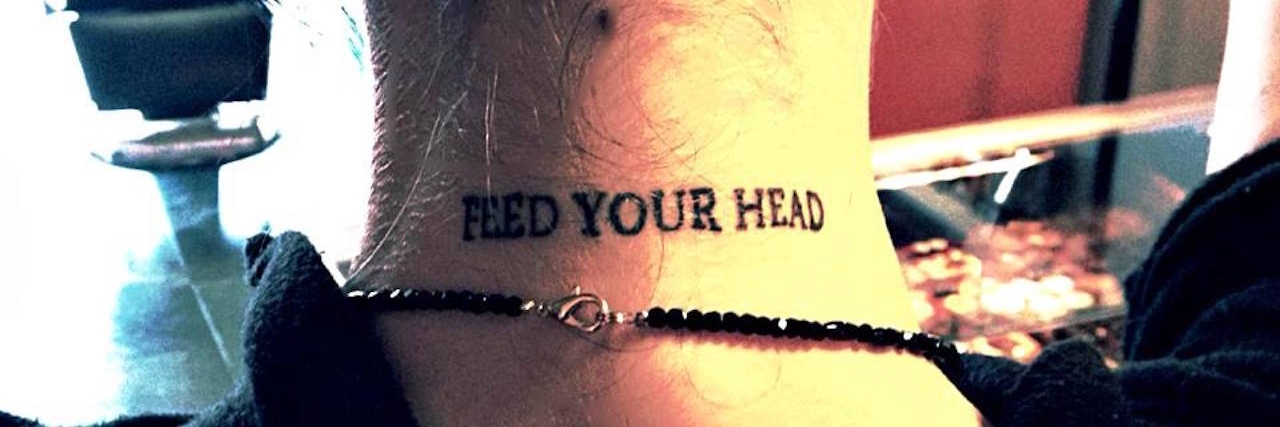 28 Beautiful Tattoos That Represent Eating Disorder Recovery Tattoo reads: Feed your brain.