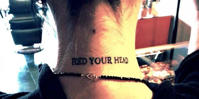 Tattoo reads: Feed your brain.