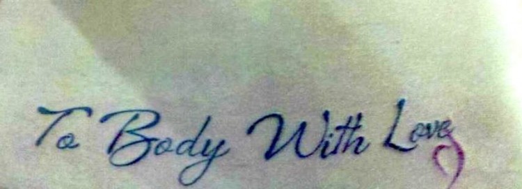 Tattoo reads: To body with love.