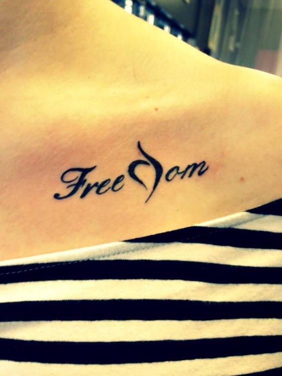 Tattoo reads Freedome