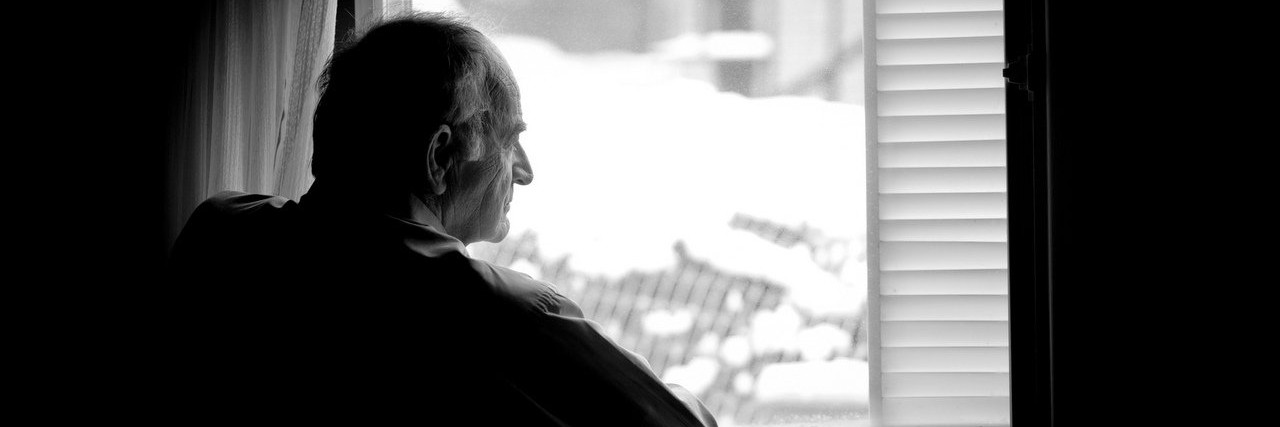 Father Always Feels Absence of His Son Who Passed Away man looking out the window
