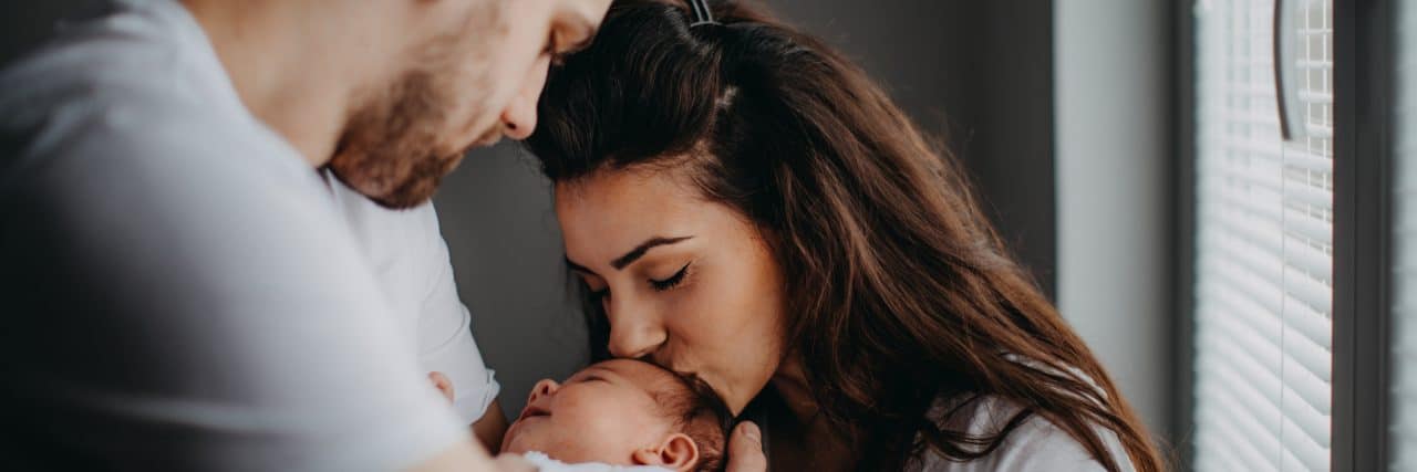 My Identity as Parent of Child With Medical Condition Parents holding baby