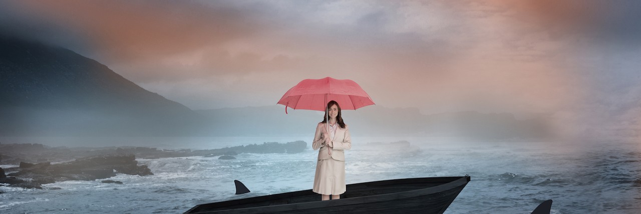 Advice for Parents When Your Child Has an Eating Disorder Woman in a small boat in a sea of sharks