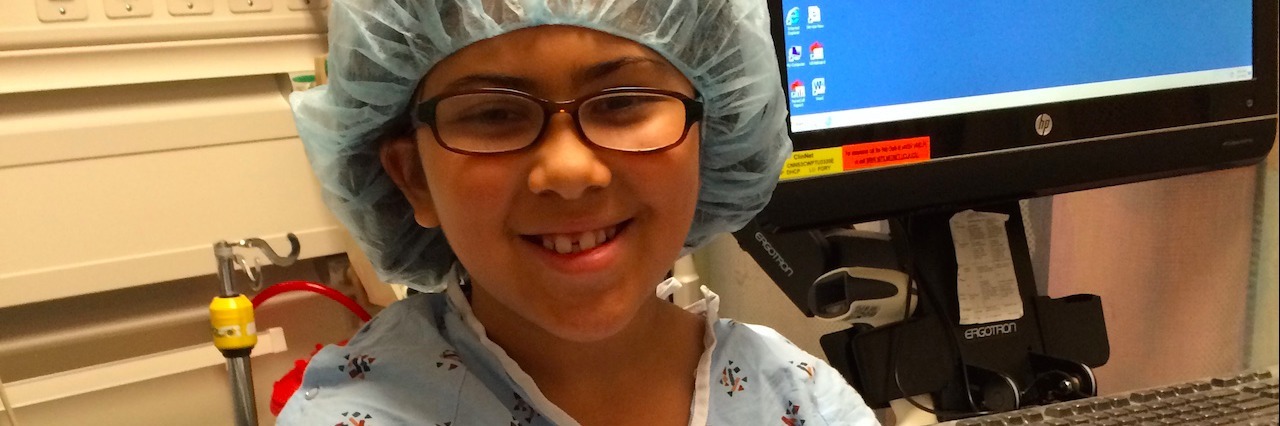 Angela's daughter smiling before surgery