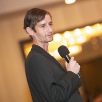 Andy speaking at an SBS conference