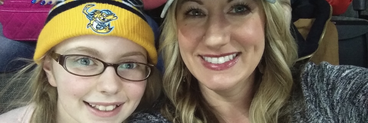 Deciding Whether to Treat Your Undiagnosed Symptoms Betsy and her daughter smiling