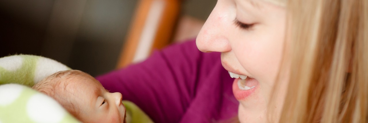 Why I Never Want to Forget the Worst Day of My Life Stacey holding her baby