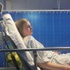 Natasha lying in a hospital bed