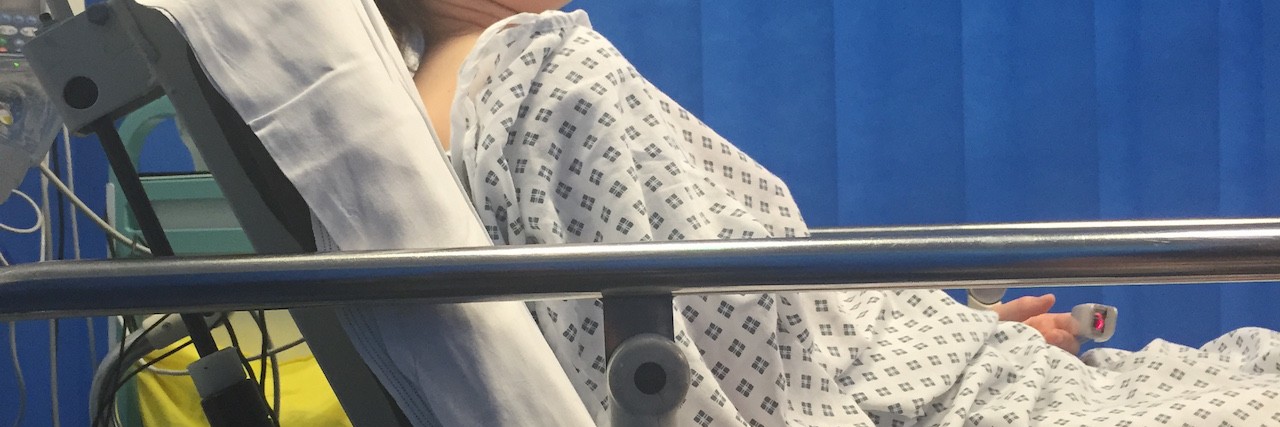 My Near-Death Experience With Mast Cell Activation Disorder Natasha lying in a hospital bed