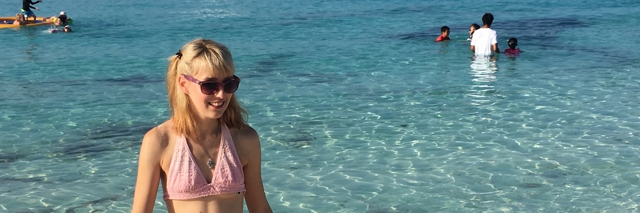 mom and daughter in ocean