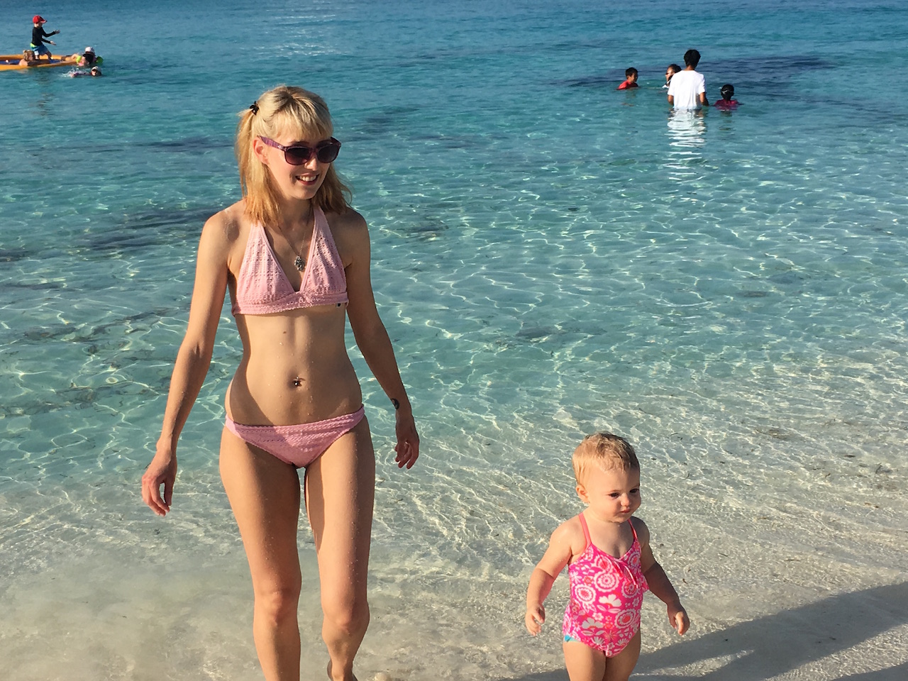 mom and daughter in ocean