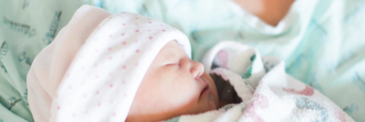 Breastfeeding My Baby With Down Syndrome Kara Holmes and her daughter, Alisa