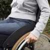 Woman sitting in wheelchair